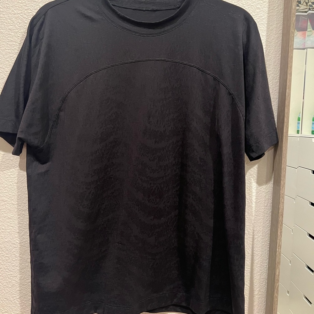 Black like new  LuLuLemon top.  PLUS FREE SHIPPING